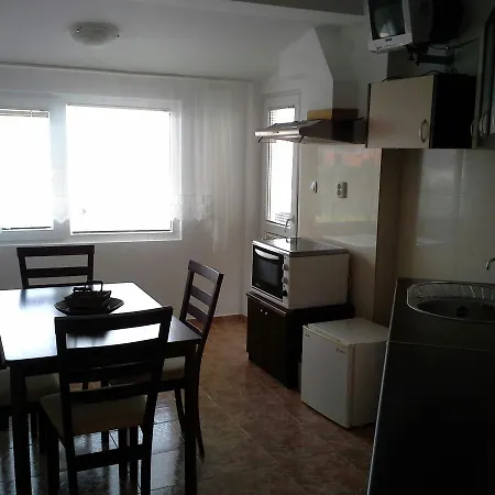 In Apartment *